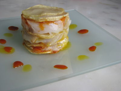 Timbal de bacalao con sobrasada, miel y reducción de naranja